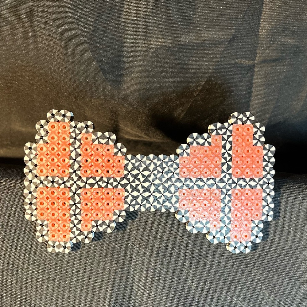JXL: Peach Bow tie brooch